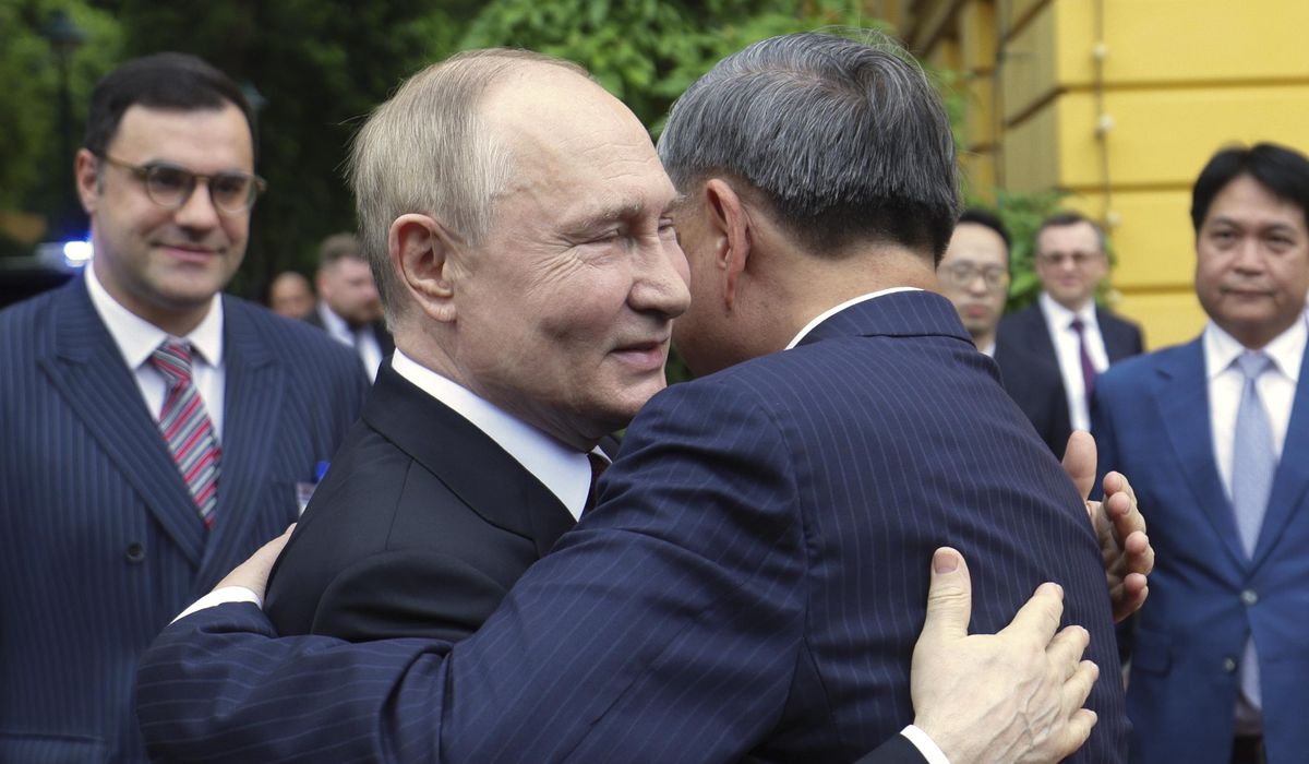 NextImg:Putin signs deals with Vietnam in bid to shore up ties in Asia