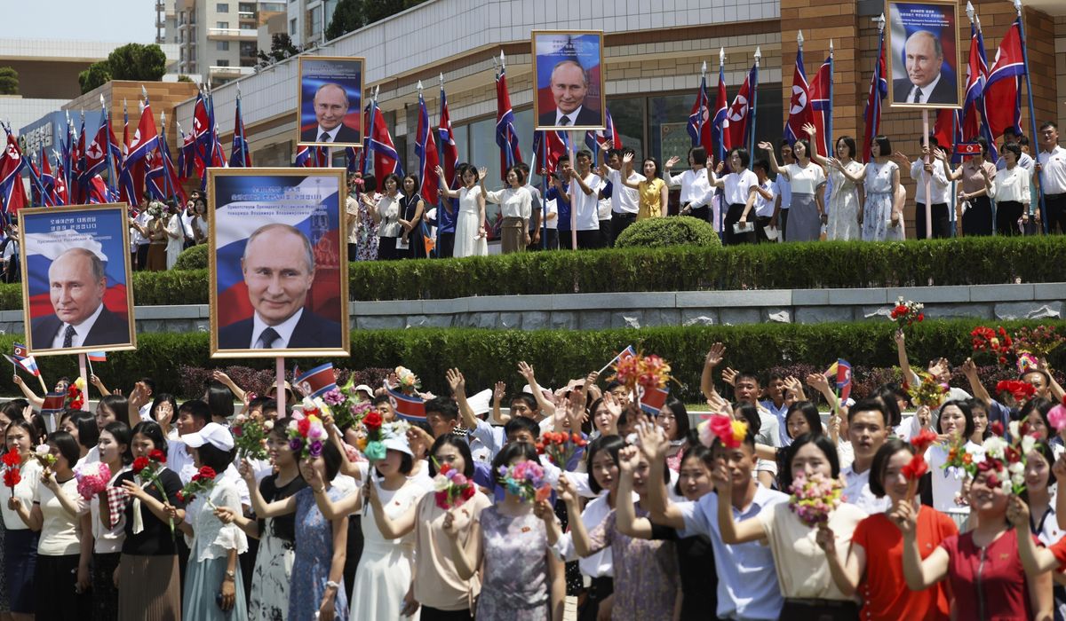 NextImg:In Hanoi, Putin warns NATO, South Korea as his Asian tour, agreements face potential blowback