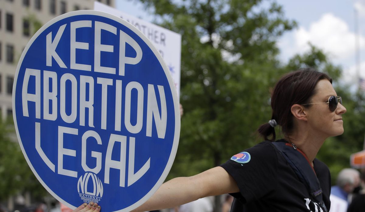 NextImg:Biden campaign rips Trump over ‘barbaric’ abortion laws