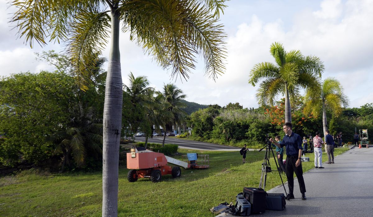 NextImg:Saipan, placid island setting for Assange’s last battle, is briefly mobbed — and bemused by fuss
