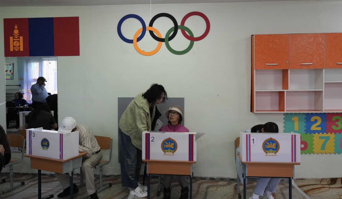 NextImg:Democratic Mongolia, squeezed between authoritarian China and Russia, votes for new parliament