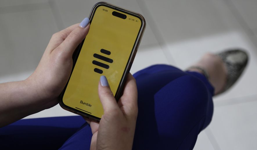 The dating app Bumble is shown on a smart phone on Wednesday, June 26, 2024, in New York. Plenty of happy couples can trace their meet-cute moment to an online dating app. But many others find the never-ending process of likes, swipes, taps and awkward DMs that go nowhere to be exhausting. (AP Photo/Peter Morgan)