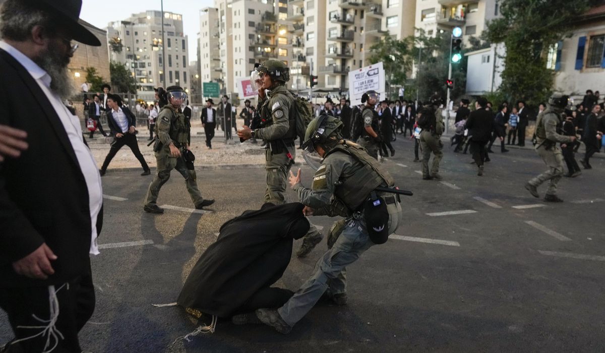 NextImg:Israel to begin drafting ultra-Orthodox Jews