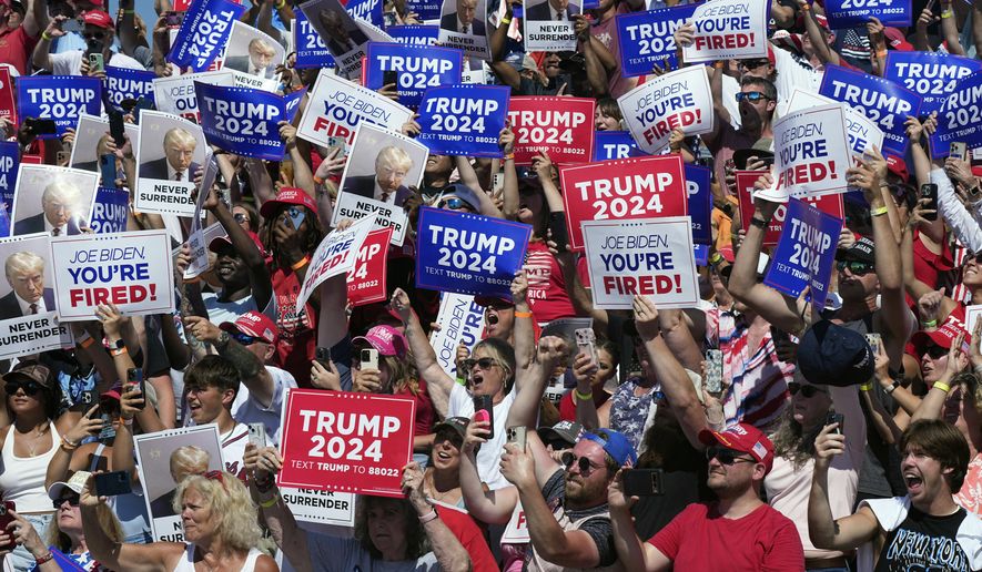 Supporters cheer as Republican presidential candidate former President Donald Trump arrives at a campaign rally in Chesapeake, Va., Friday, June 28, 2024. (AP Photo/Steve Helber)