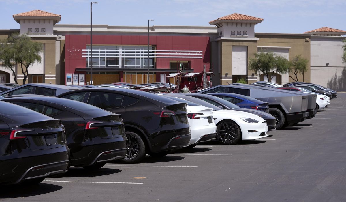 NextImg:Tesla EV market share drops below 50%