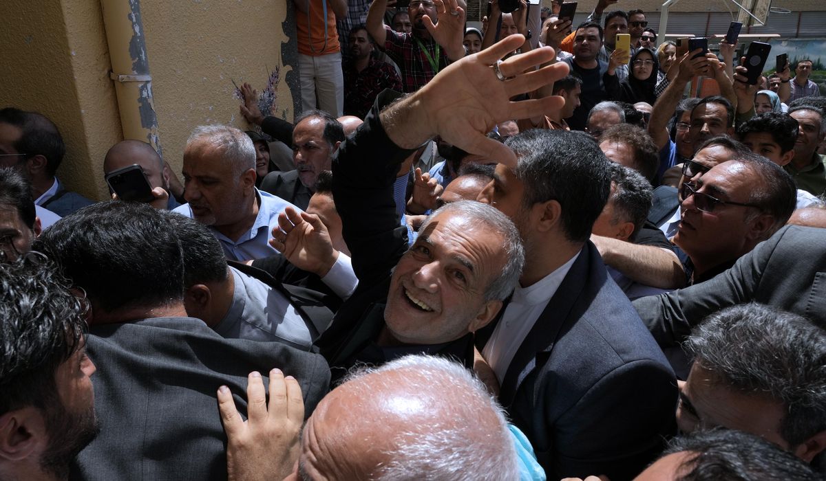 NextImg:Iran holds runoff presidential vote pitting hard-line former negotiator against reformist lawmaker