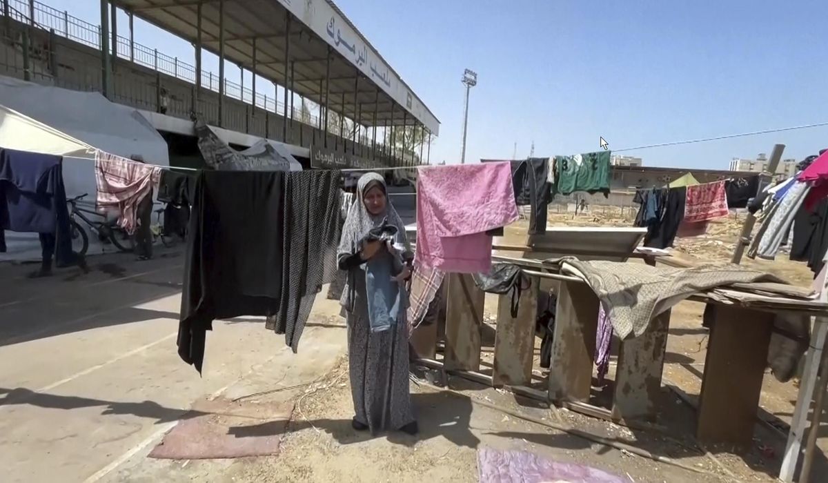 NextImg:Gaza soccer stadium is now a shelter for thousands of displaced Palestinians