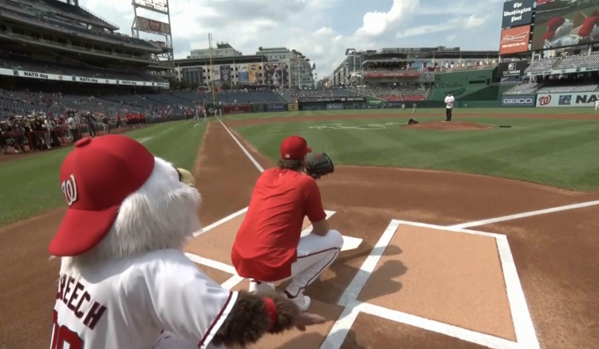 NextImg:NATO chief throws first pitch for the Washington Nationals baseball team