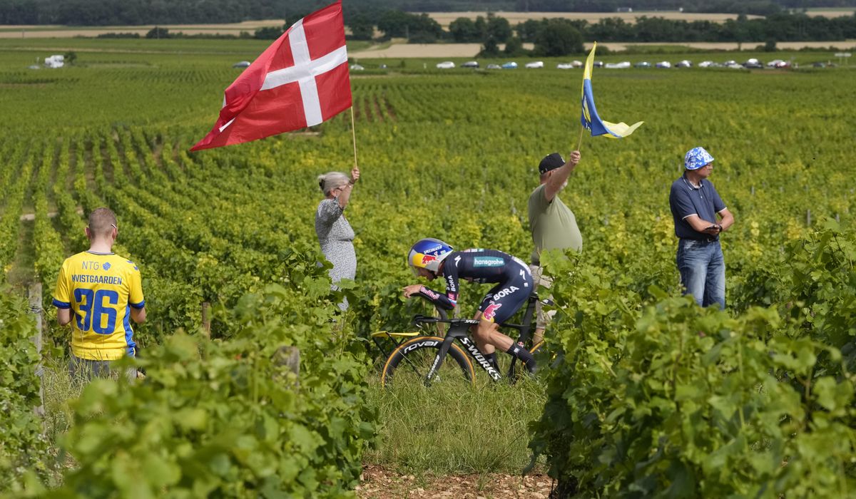 NextImg:‘Then it’s gone forever:’ Photographers race to capture fleeting Tour de France scenes