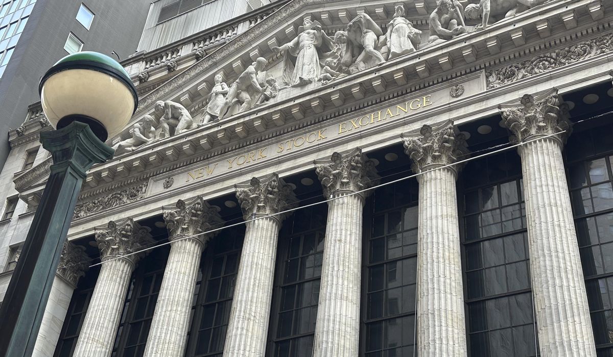 NextImg:Wall Street holds near record highs as inflation cools again