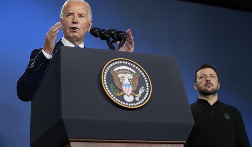 President Joe Biden, joined by President of Ukraine Volodymyr Zelenskyy, speaks on the sidelines of the NATO Summit in Washington, July 11, 2024. (AP Photo/Susan Walsh, File)