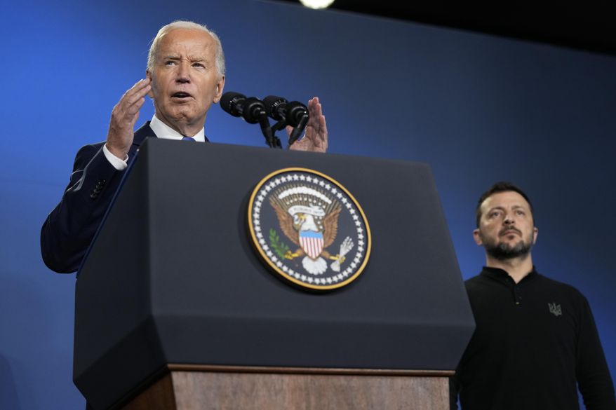 President Joe Biden, joined by President of Ukraine Volodymyr Zelenskyy, speaks on the sidelines of the NATO Summit in Washington, July 11, 2024. (AP Photo/Susan Walsh, File)