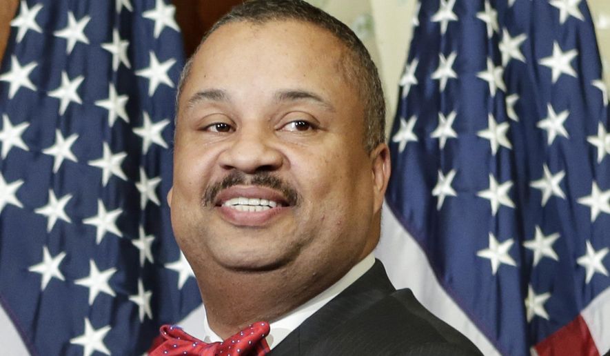 FILE - Rep. Donald Payne Jr., D-N.J., poses for a ceremonial photo in the Rayburn Room of the U.S. Capitol after the new 113th Congress convened, Jan. 3, 2013, in Washington. New Jersey Democrats are set to pick from a crowded field of nearly a dozen people for their House candidate in a special northern New Jersey primary, Tuesday, July 26, 2024, following Payne's death earlier this year. The special general election is slated for Sept. 18. (AP Photo/J. Scott Applewhite, File)