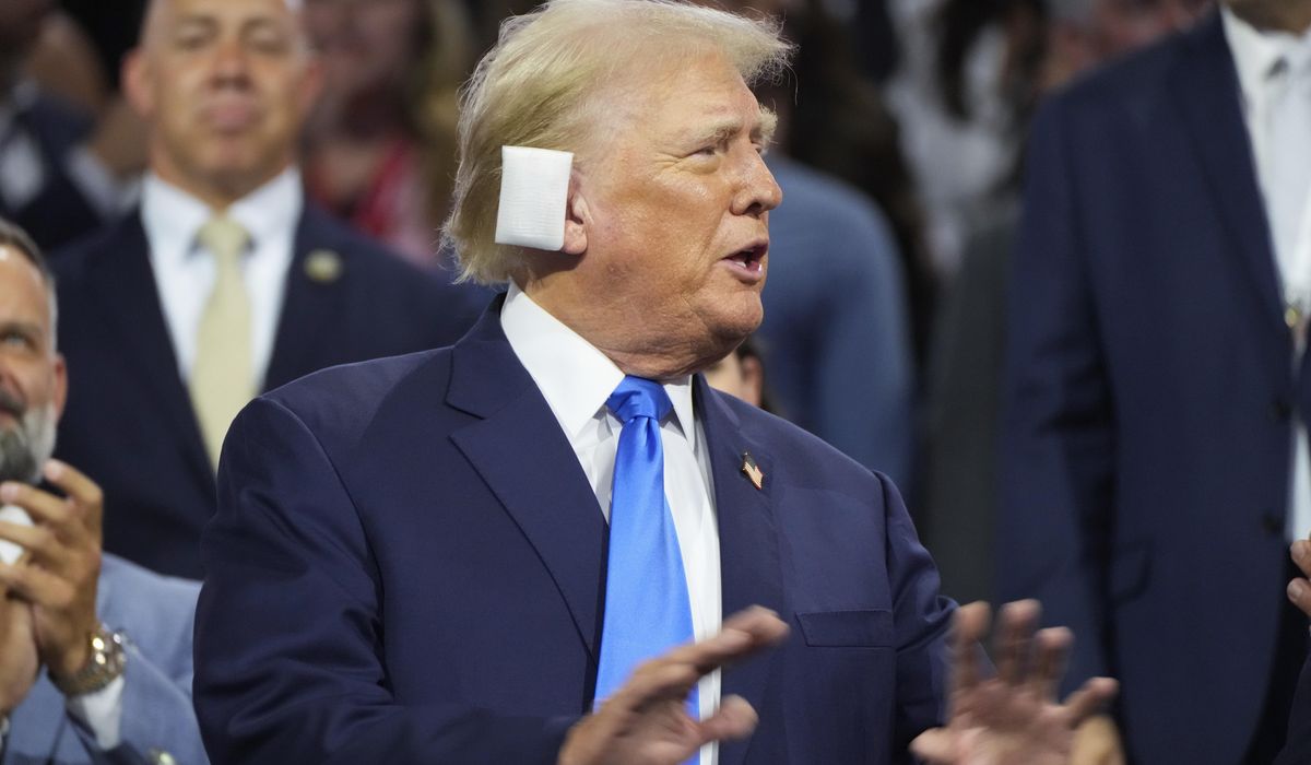 NextImg:Trump is back for RNC day two with ear still wrapped
