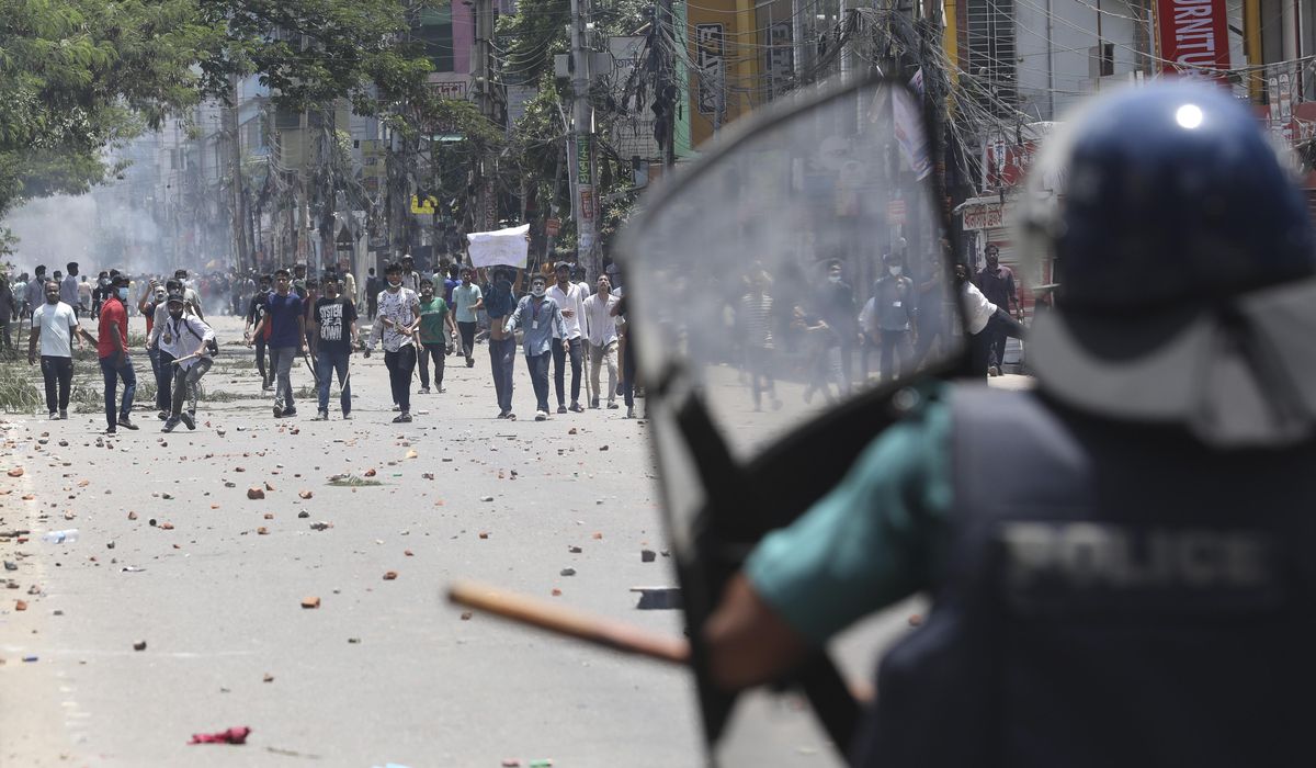 NextImg:Bangladesh imposes strict curfew with a ‘shoot-on-sight-order’ following deadly protests