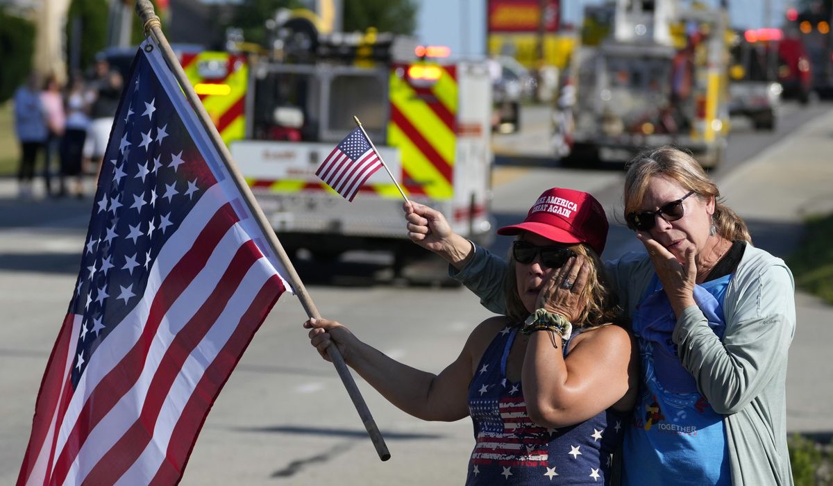 NextImg:‘He took a bullet for us’: Trump fans flock to first post-shooting rally