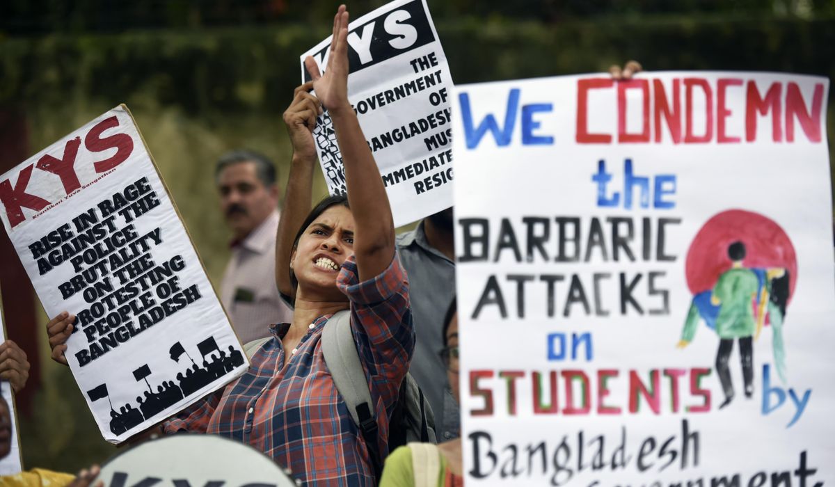 NextImg:Bangladesh security forces fire bullets and sound grenades as protests over government jobs escalate