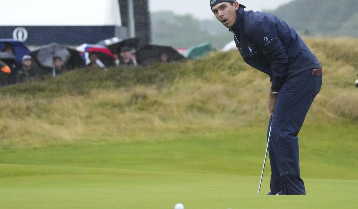 NextImg:Horschel leads British Open on wild day of rain and big numbers at Royal Troon