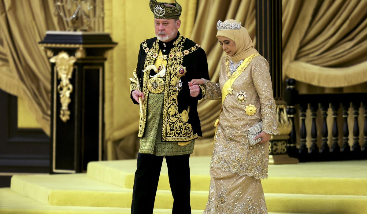 NextImg:Malaysia honors a new king in coronation marked by pomp and cannon fire