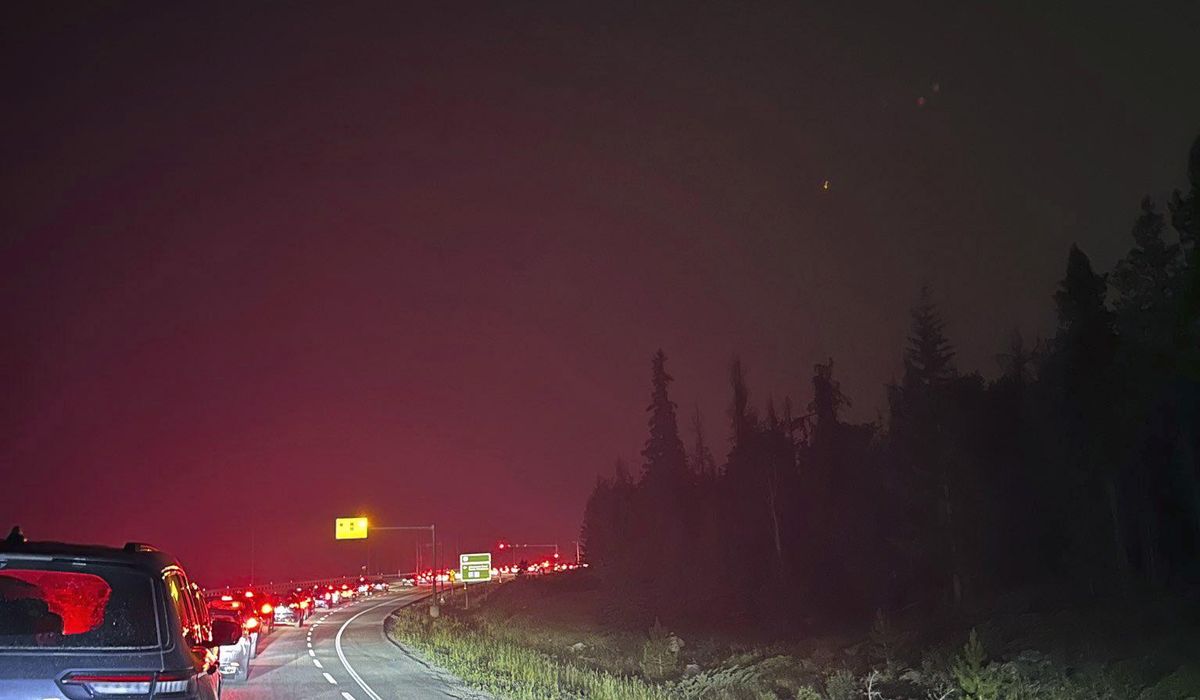 NextImg:Wildfires near Canada’s Jasper National Park prompt evacuation. Fleeing vehicles clog highways