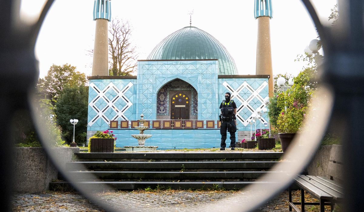 NextImg:Germany carries out raids and bans a group accused of links to Iran and support for Hezbollah