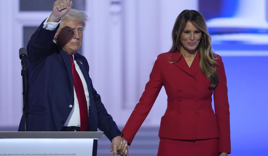 Republican presidential candidate former President Donald Trump is joined on stage by former first lady Melania Trump at the Republican National Convention Thursday, July 18, 2024, in Milwaukee. (AP Photo/J. Scott Applewhite)