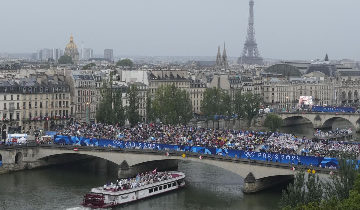NextImg:Paris Olympics begins with ambitious, sprawling opening ceremony on the River Seine