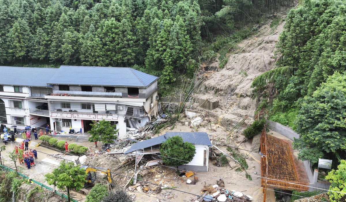NextImg:Mudslide kills 15 people near tourist site in China as rains from tropical storm Gaemi drench region