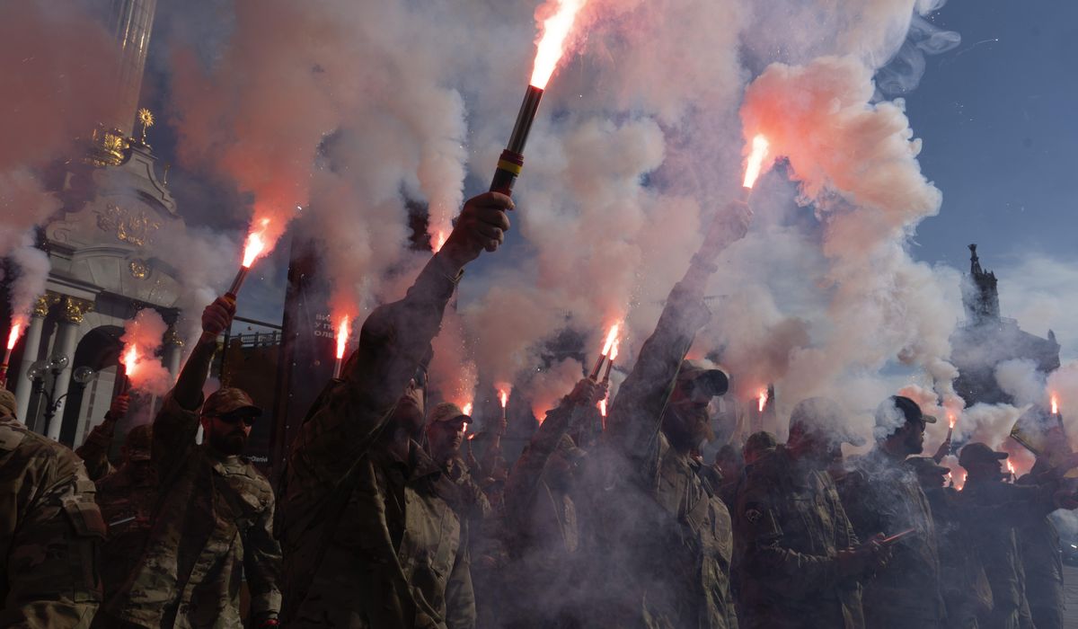 NextImg:Thousands in Ukraine honor soldiers killed in blast and urge government to get prisoners freed