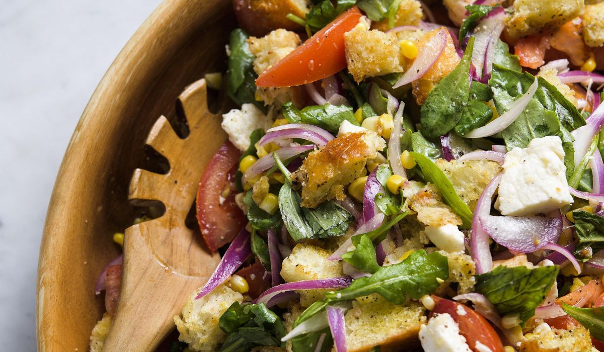 NextImg:Punchy summer flavors galore: Tomato, arugula and bread salad with fresh corn and mozzarella