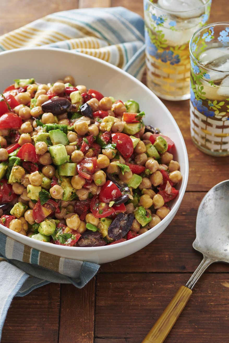 This image shows a recipe for chickpea salad in New York on May 2, 2019. (Cheyenne Cohen via AP)