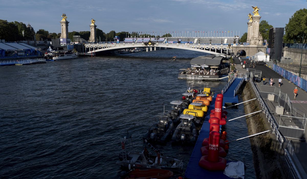 NextImg:Triathlon cancels Olympic swim training for the second day over poor water quality in the Seine