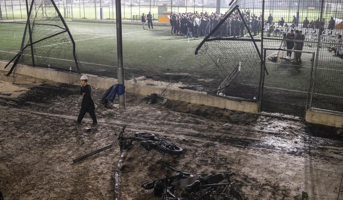 NextImg:A bloody field, mangled scooters. Clues emerge from strike that killed 12 children in Golan Heights