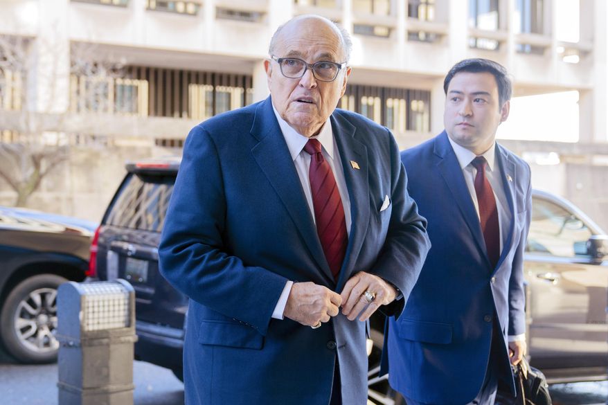 Former Mayor of New York Rudy Giuliani arrives at the federal courthouse in Washington, Dec. 11, 2023. Giuliani filed a last-minute deal Wednesday, July 31, 2024, to end his personal bankruptcy case and pay about $400,000 to a financial adviser hired by his creditors. (AP Photo/Jose Luis Magana, File)