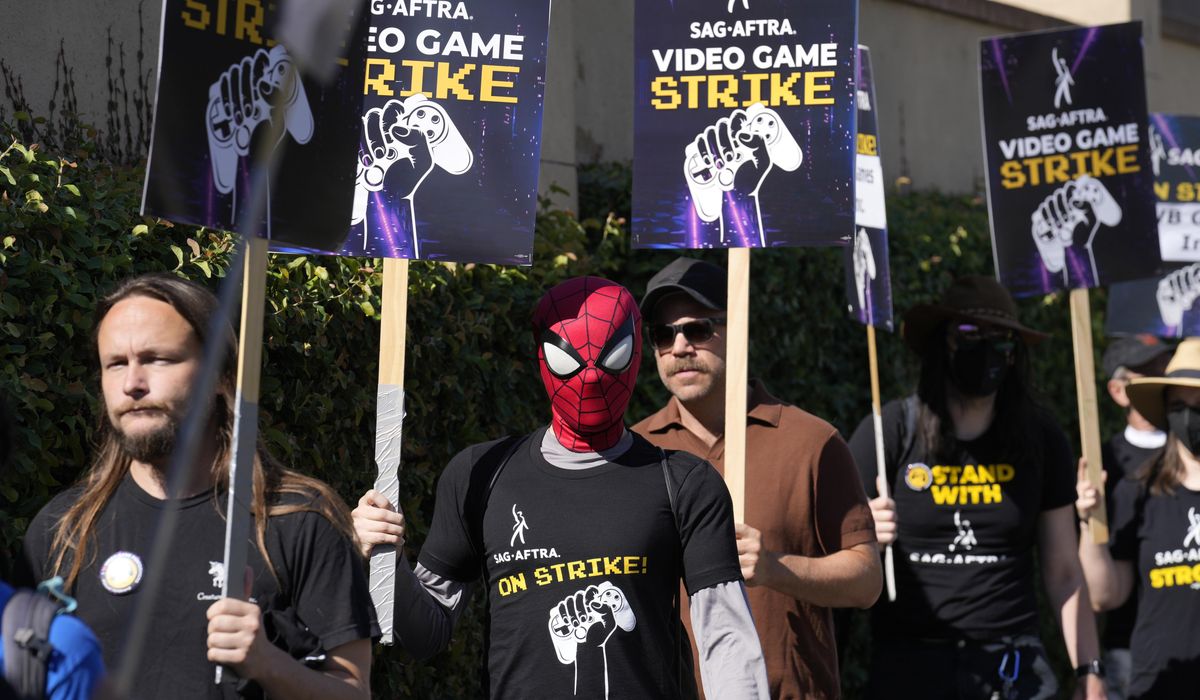 NextImg:Video game performers protest unregulated AI use at Warner Bros. Studios