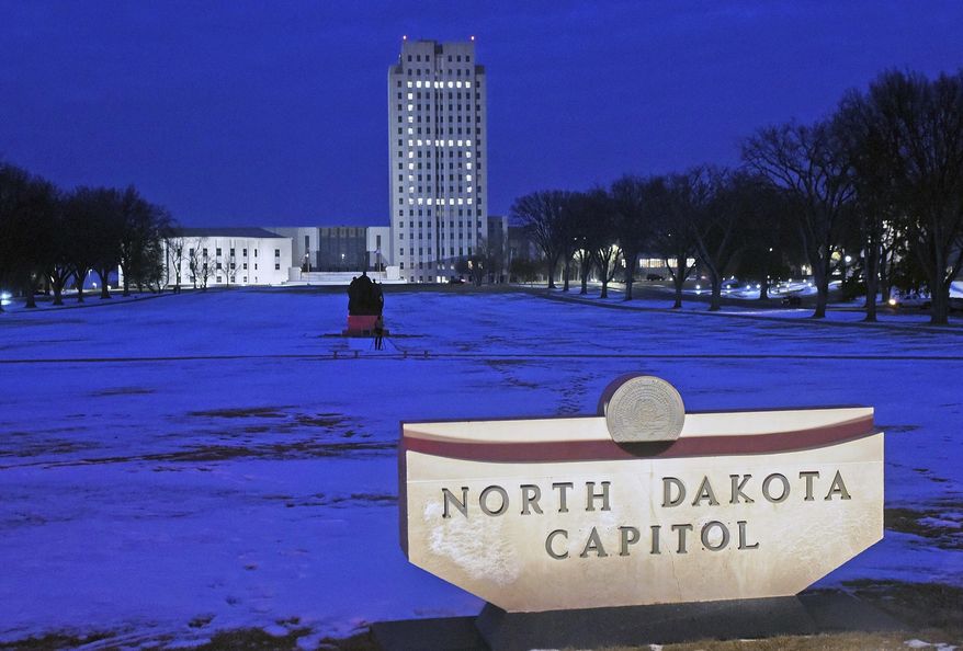 The North Dakota state capitol in Bismarck, N.D., had a subtle display of North Dakota State University pride on Tuesday, Jan. 9, 2018. (Tom Stromme//The Bismarck Tribune via AP)