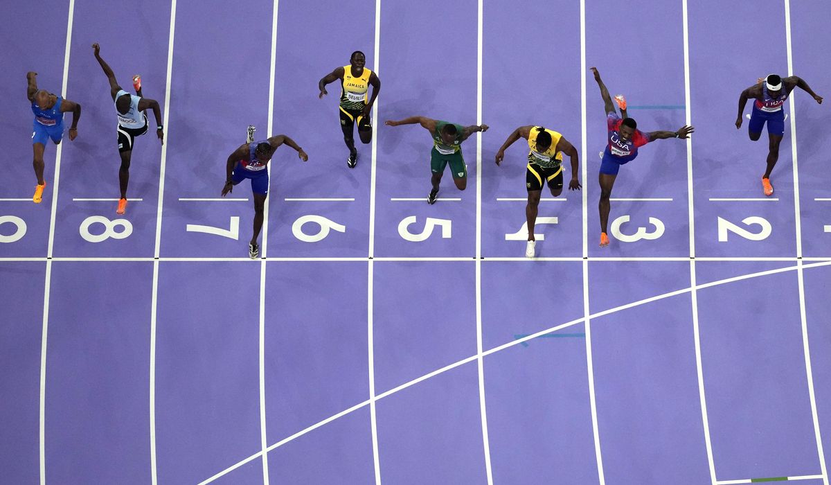 NextImg:Noah Lyles wins Olympic 100 by five-thousandths of a second, among closest finishes in Games history