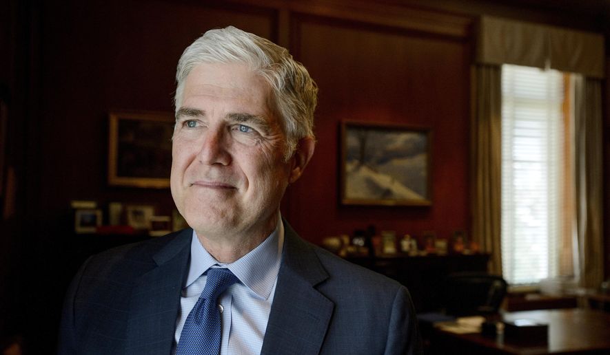 Supreme Court Justice Neil Gorsuch poses for a portrait in his office at the Supreme Court, Monday, July 29, 2024, in Washington. (AP Photo/Rod Lamkey, Jr.)