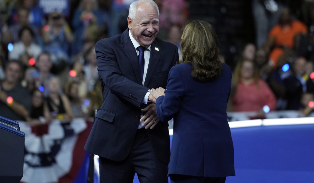 NextImg:Harris introduces running mate Walz to nation as midwestern, middle-class warrior