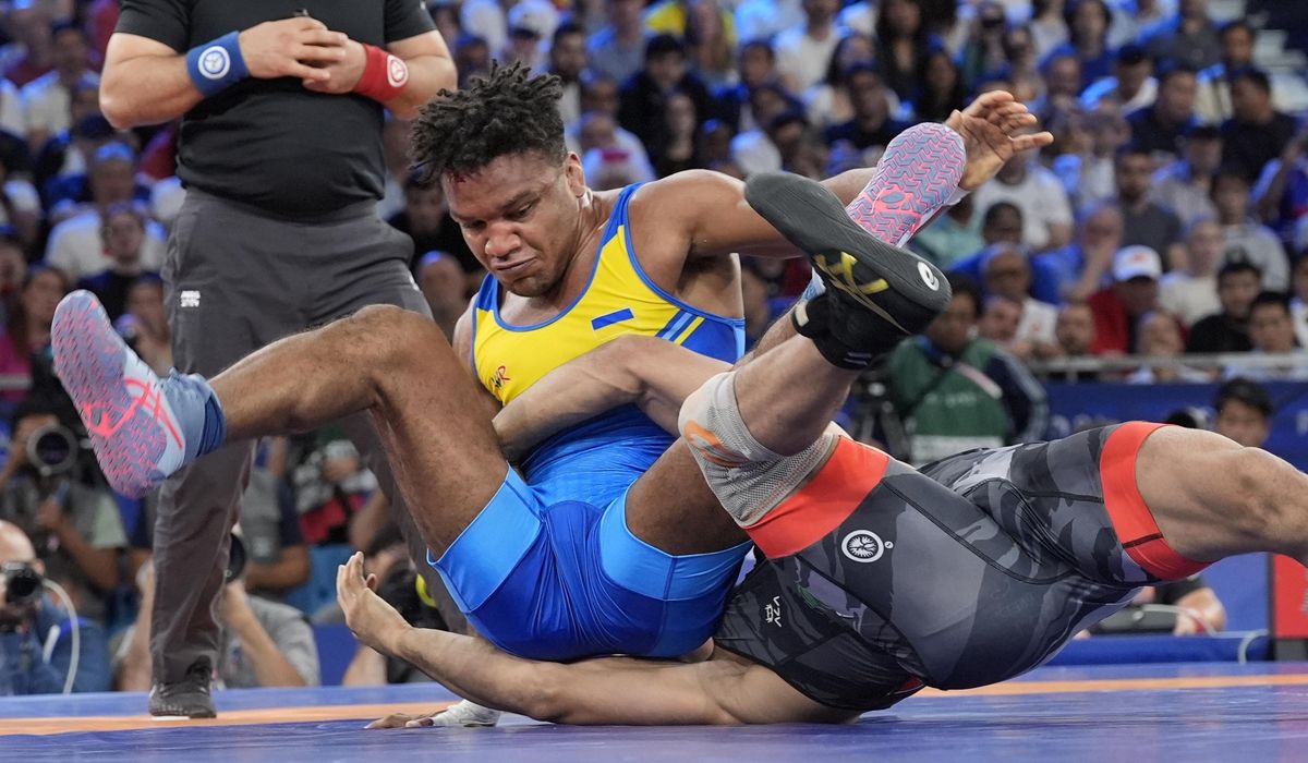 NextImg:Ukrainian wrestler and member of parliament has a goal for Paris: ‘Show that Ukraine is still alive’