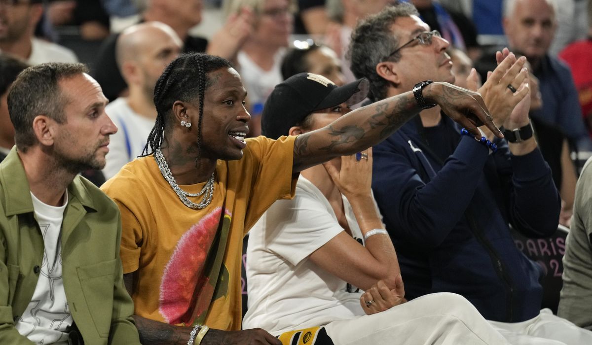 NextImg:Travis Scott is arrested at a Paris hotel after altercation with a security guard, prosecutors say