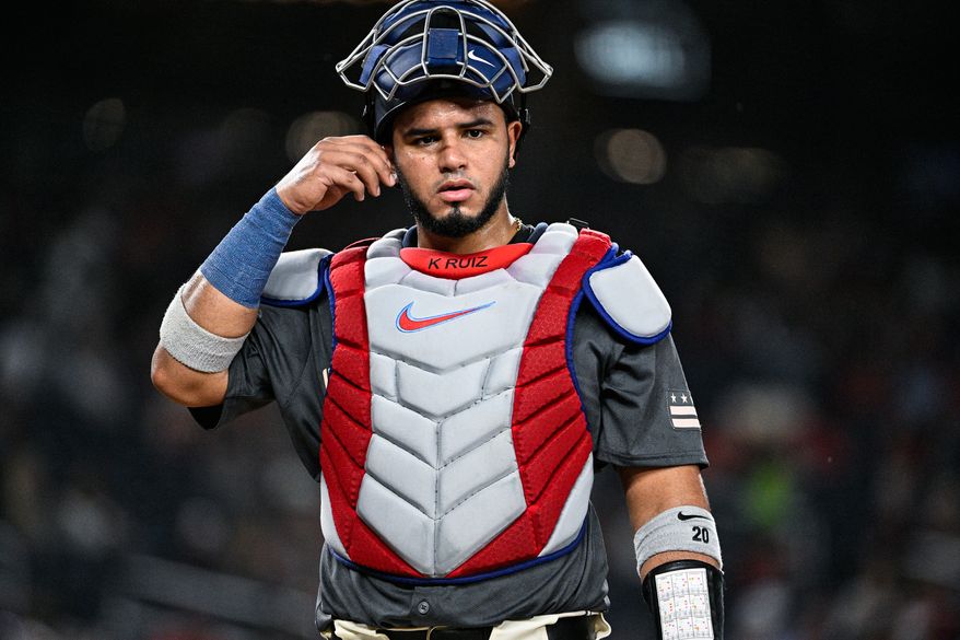 Washington Nationals catcher Keibert Ruiz (20) looks to the dugout for instructions against the Los Angeles Angels at Nationals Park, Washington D.C., August 9, 2024. (Photo by Brian Murphy for the Washington Times)