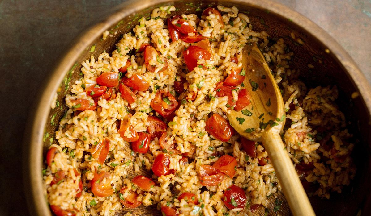 NextImg:Fresh tomatoes and tomato paste impart deep flavor in this comforting Indian rice dish