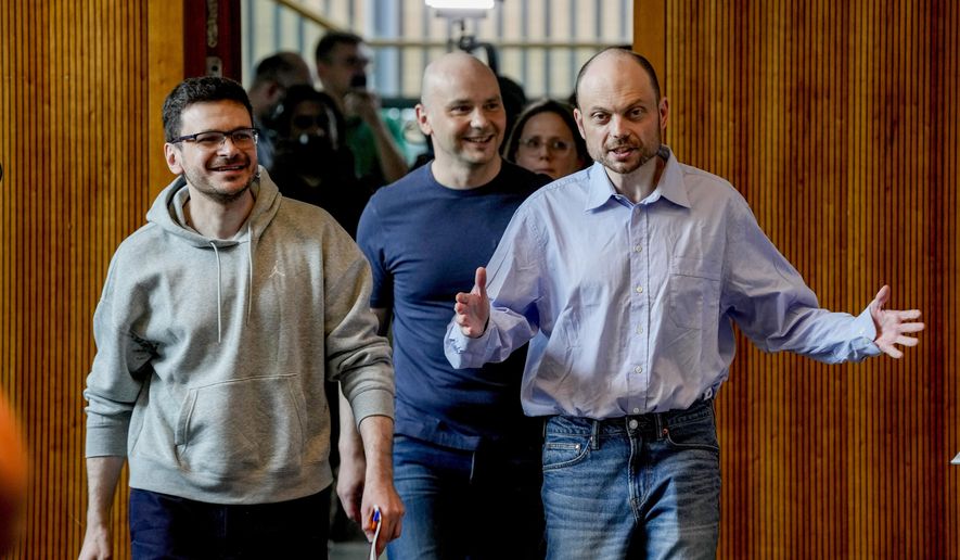Freed Russian prisoners Ilya Yashin, Andrei Pivovarov and Vladimir Kara-Murza, from left, enter a news conference in Bonn, Germany, on Aug. 2, 2024, a day after they were released as part of an East-West prisoner swap. (AP Photo/Michael Probst, File)