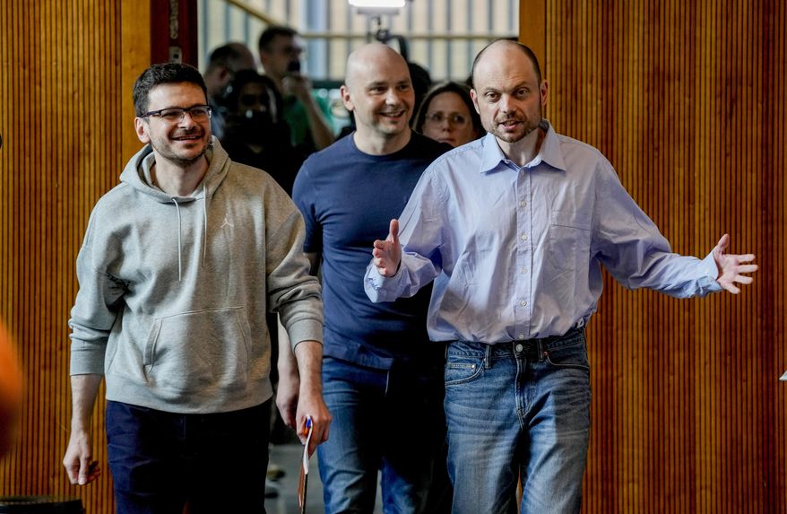 Freed Russian prisoners Ilya Yashin, Andrei Pivovarov and Vladimir Kara-Murza, from left, enter a news conference in Bonn, Germany, on Aug. 2, 2024, a day after they were released as part of an East-West prisoner swap. (AP Photo/Michael Probst, File)