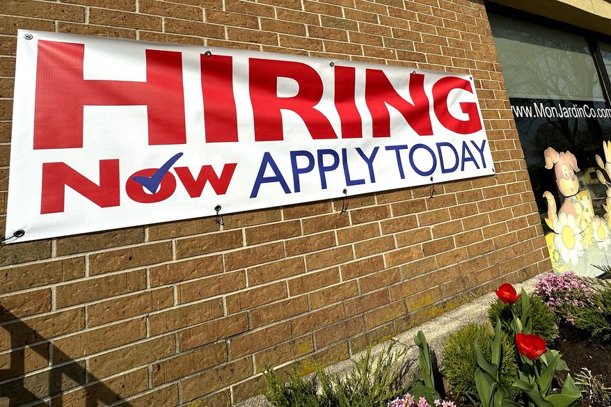 A hiring sign is displayed in Riverwoods, Ill., on April 16, 2024. (AP Photo/Nam Y. Huh, File)