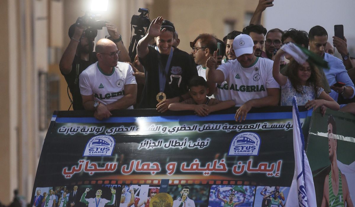 NextImg:Sex-disputed gold medal boxer Imane Khelif hailed upon return to Algeria
