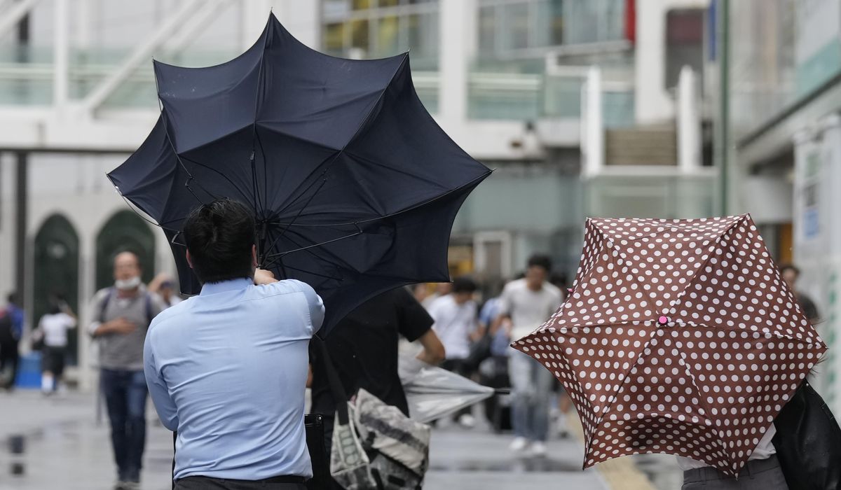 NextImg:Evacuation ordered in northern Japan, flights and trains canceled in Tokyo as a typhoon approaches