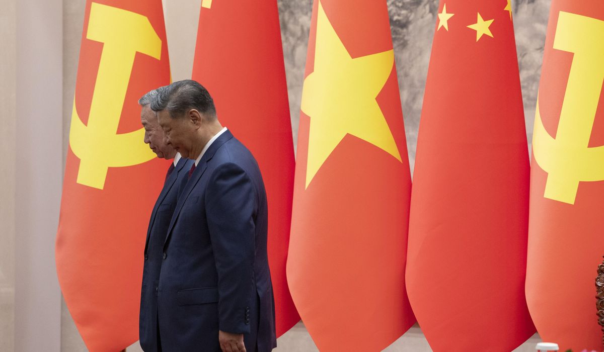 NextImg:Leaders of China and Vietnam pledge to strengthen political and economic ties