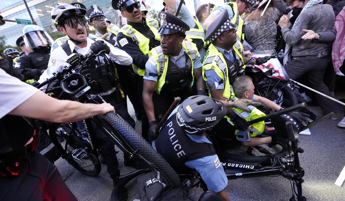 NextImg:Protesters confront police outside Israeli consulate on 2nd night of Democratic convention